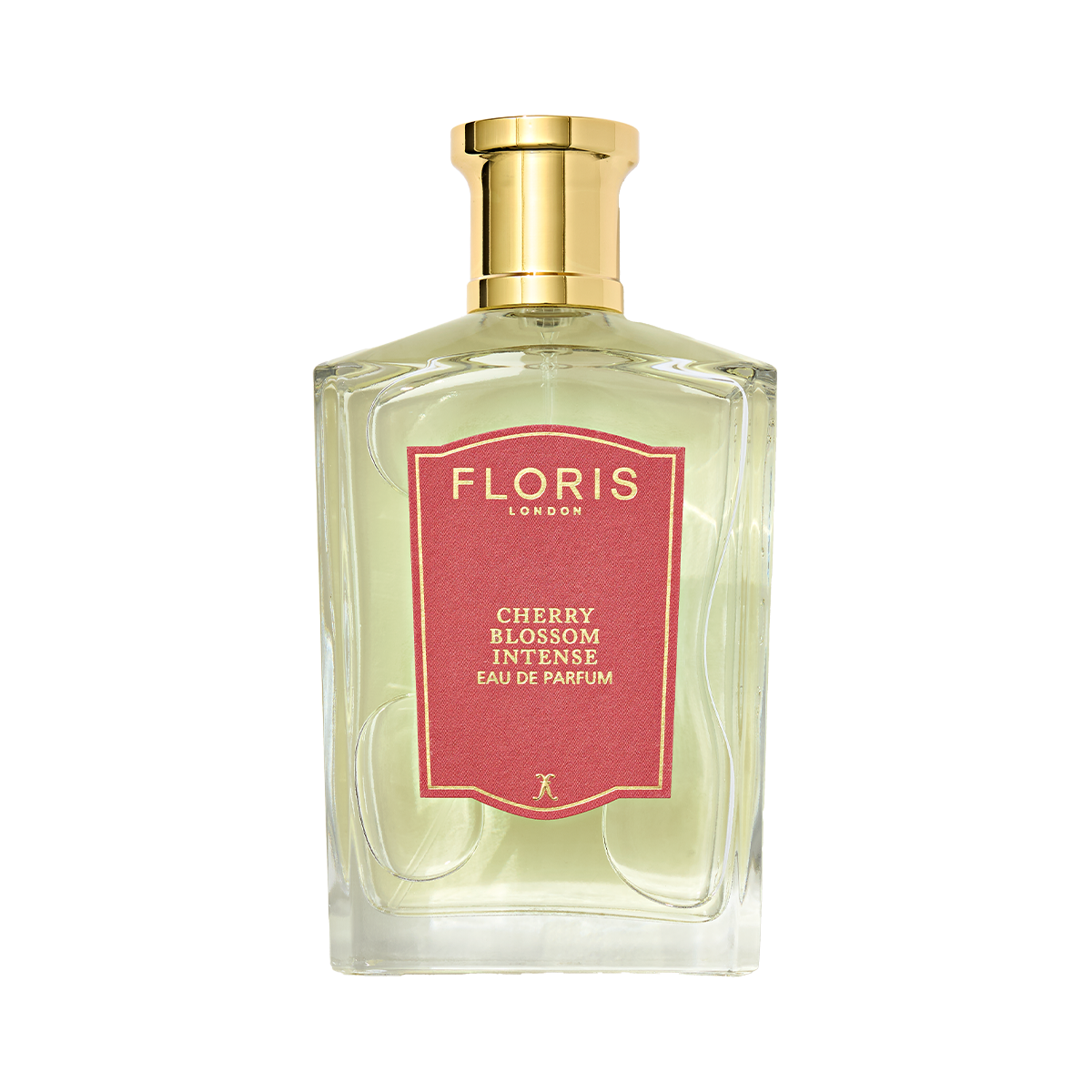 A bottle of Floris London Cherry Blossom Intense Eau de Parfum features a gold cap, pink label, and a vibrant floral-fruity fragrance.