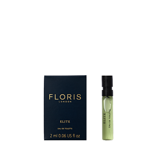 A 2ml sample vial of Floris London Elite - Eau de Toilette stands next to its navy box, highlighting the timeless scent from this classic British brand.