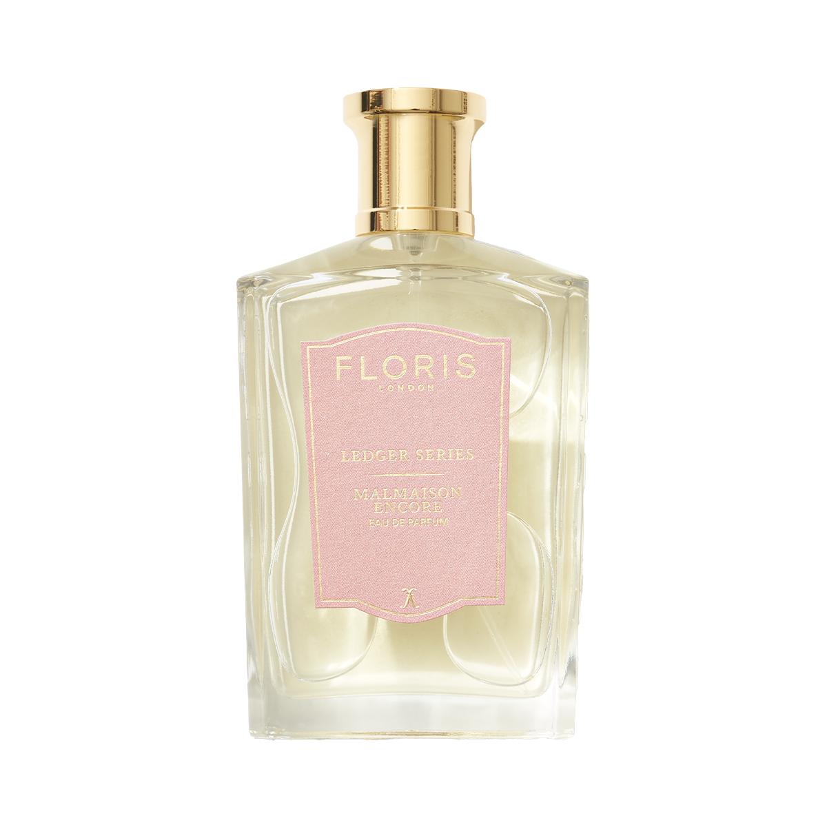 Clear glass bottle of Floris London Malmaison Encore perfume with a gold cap and pale pink label, featuring floral oriental notes of cedarwood, musk, and patchouli.