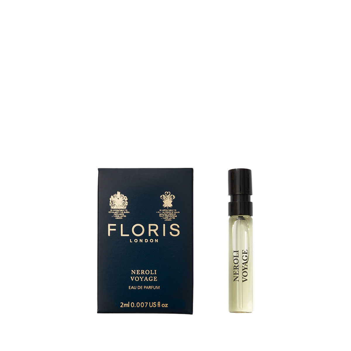 A perfume sample bottle sits next to a navy Floris London box labeled "Neroli Voyage - Eau de Parfum," exuding the scent of neroli and warm amber.