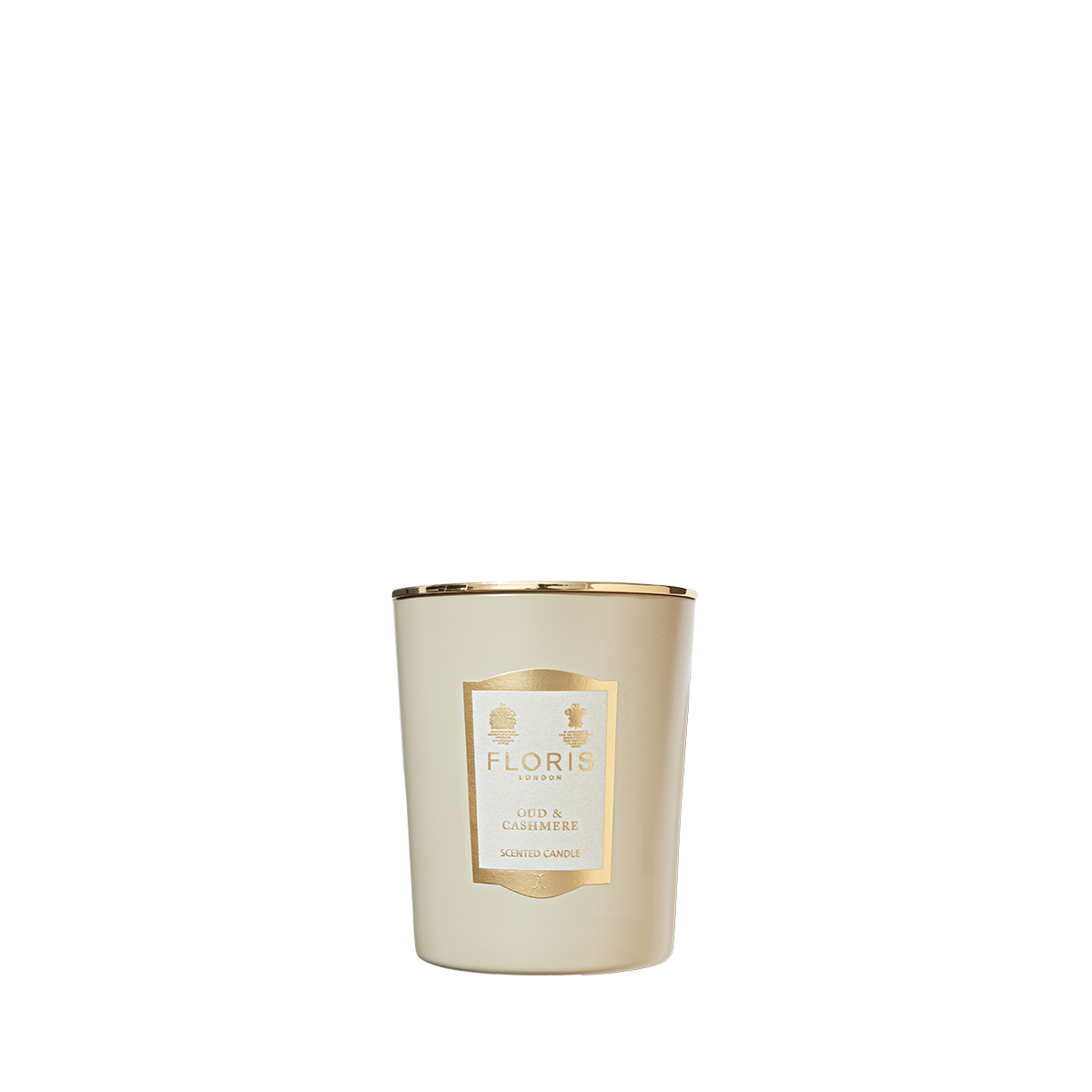 The Floris London Oud & Cashmere Scented Candle, in a gold-trimmed glass jar, adds a touch of luxury fragrance to any room.