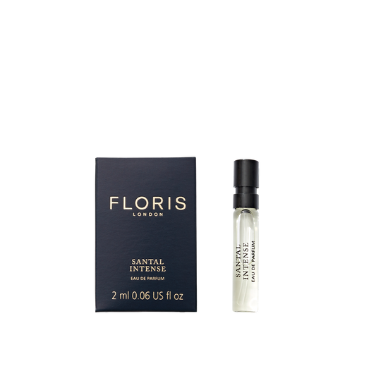 A 2ml sample vial of Floris London Santal Intense Eau de Parfum, shown next to its black and gold box—a contemporary sandalwood fragrance.