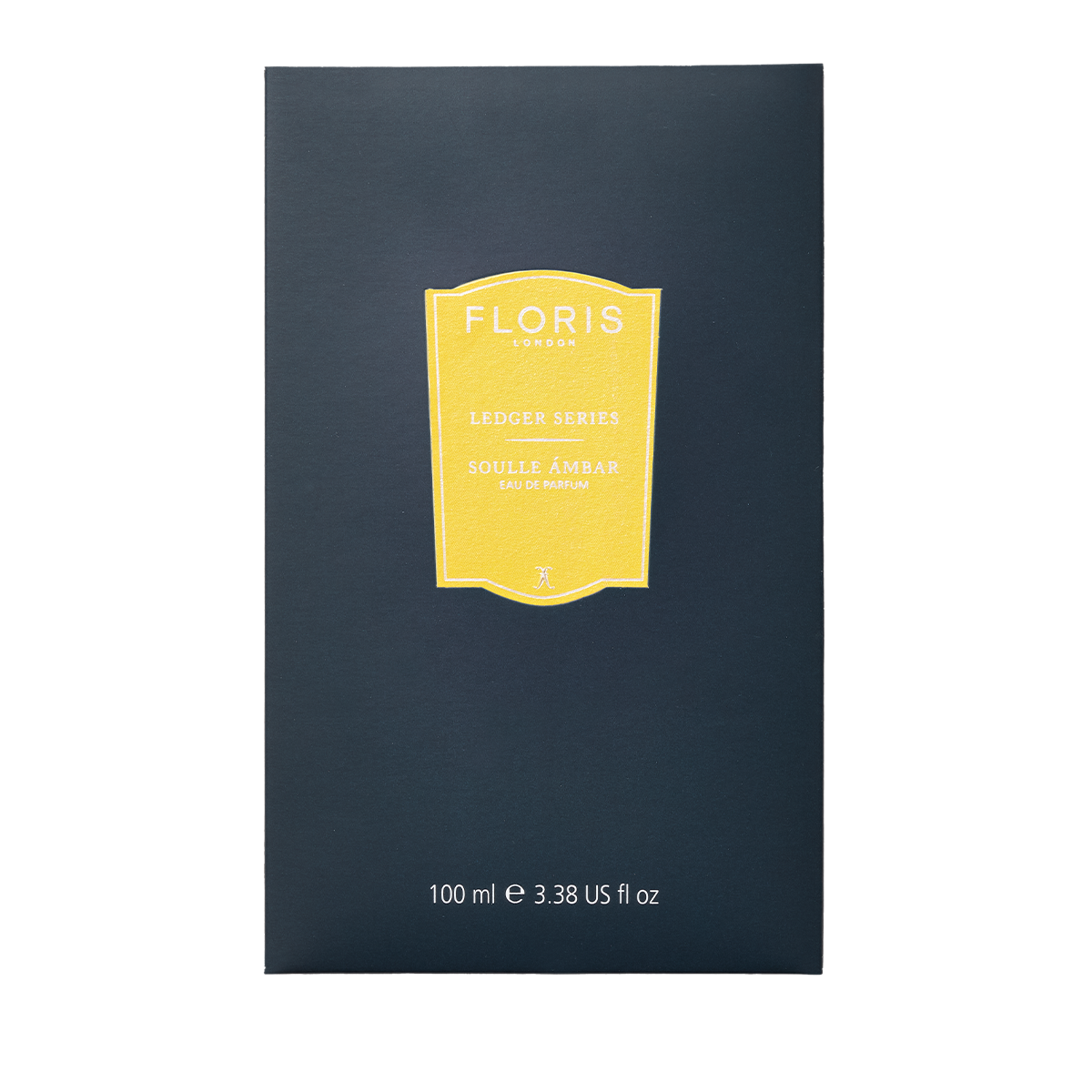 A dark blue box of Floris London Soulle Ámbar Eau de Parfum, 100ml, with a yellow label, features a warm amber and fruity pineapple scent.