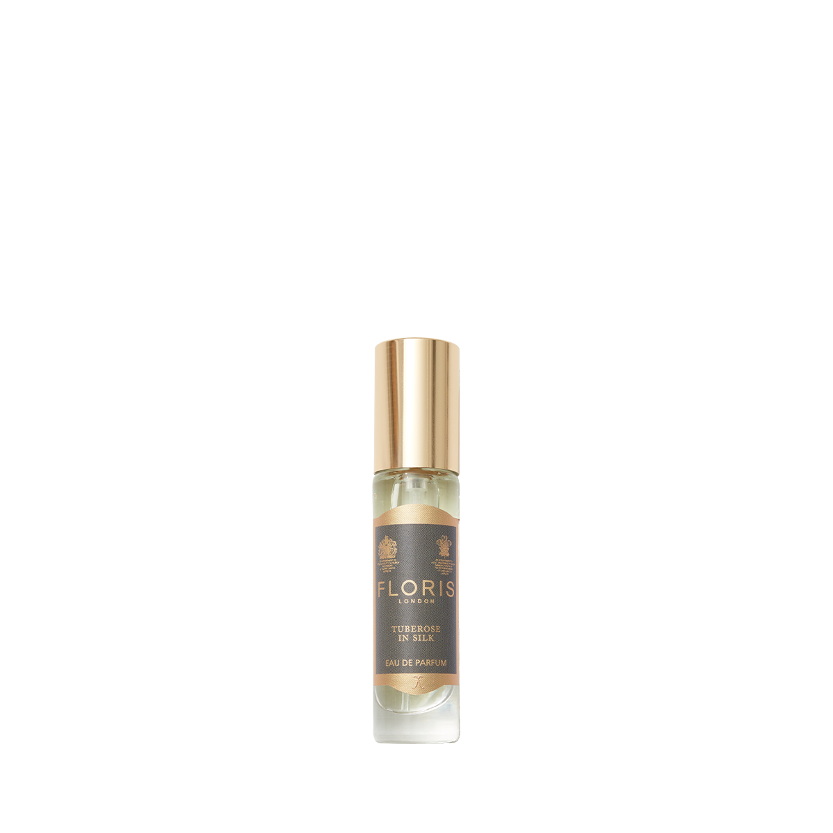 A small glass perfume bottle with a gold cap and a dark label reads "Tuberose In Silk by Floris London," perfect for fans of jasmine scents.