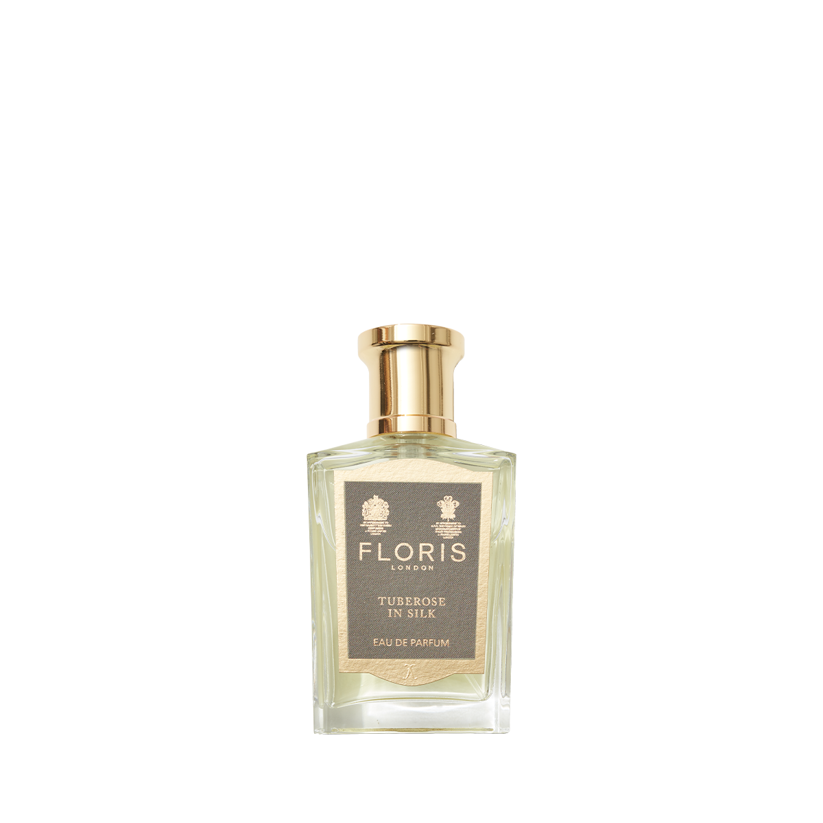 A glass bottle of Floris London Tuberose In Silk Eau de Parfum, gold-capped, with a luxurious tuberose and jasmine fragrance.