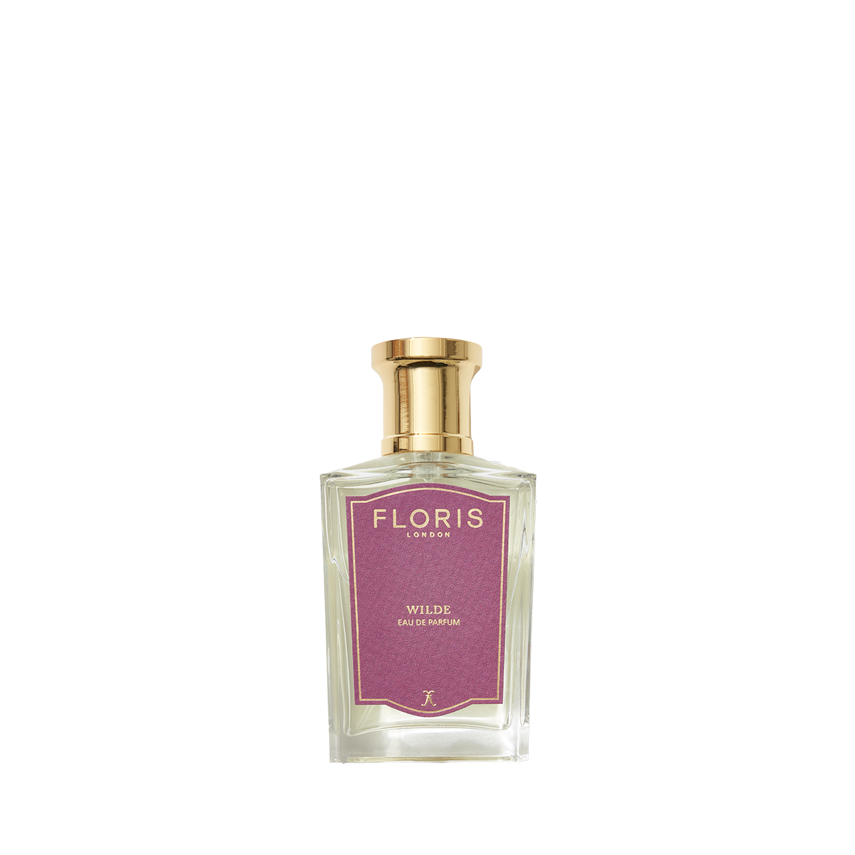 A clear glass bottle of Floris London Wilde Eau de Parfum with a gold cap and purple label, inspired by Oscar Wilde’s creative spirit.