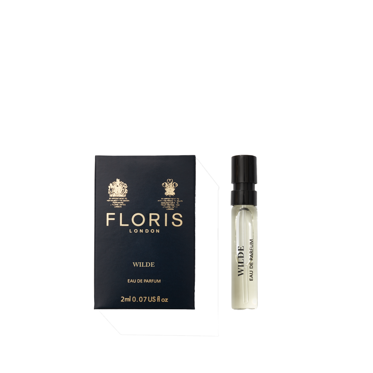 A Floris London Wilde - Eau de Parfum sample vial sits beside its navy blue box, embodying individuality and creative expression.
