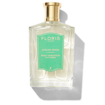 A bottle of Floris London Rose Geranium Eau de Parfum with a gold cap stands against a white background.