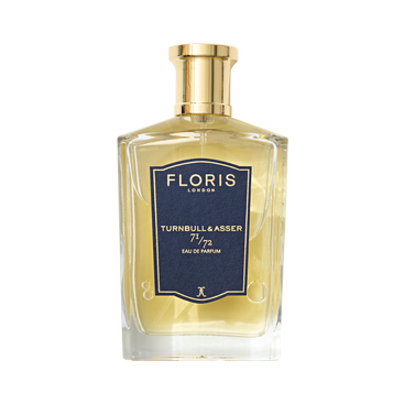 A bottle of Floris London 71/72 - Eau de Parfum, a vegan woody scent, with a gold cap and navy blue label.