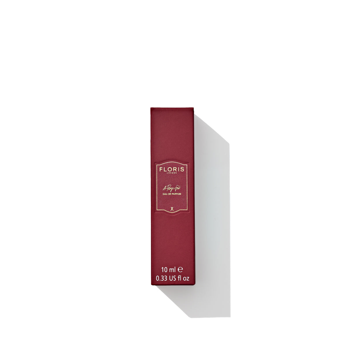 A red rectangular box of Floris London brand perfume with gold lettering, containing an enchanting 10 ml (0.33 US fl oz) contemporary fragrance named "A Rose For... - Eau de Parfum.