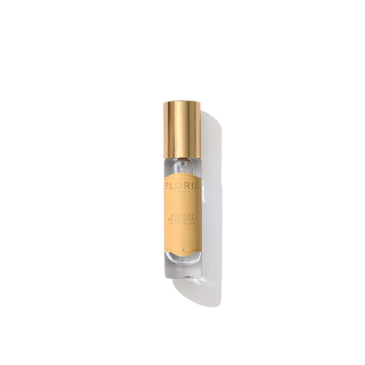 A clear perfume bottle with a gold cap labeled "Floris London Bouquet de La Reine - Eau de Toilette" against a white background, hinting at its fruity floral essence.