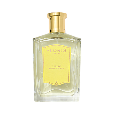 A clear glass bottle of Floris London Cefiro Eau de Toilette unisex fragrance, with a gold cap and yellow label.