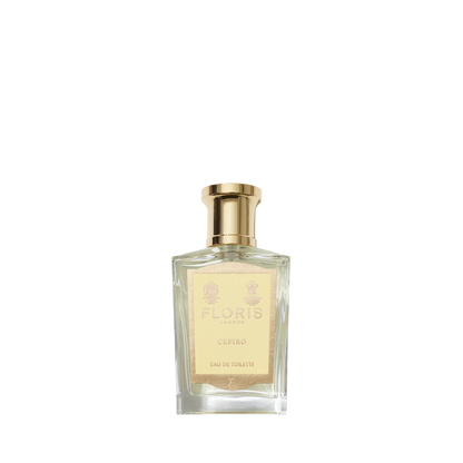 Clear glass bottle of Cefiro - Eau de Toilette by Floris London, a unisex citrus-woody fragrance with gold label and cap, on white background.