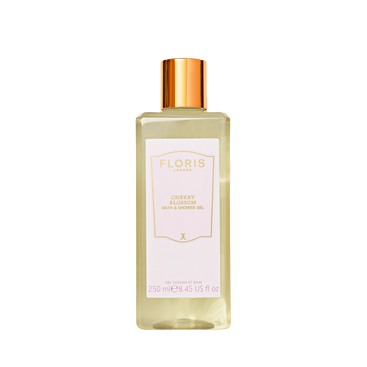 A clear bottle of Floris London UK Cherry Blossom Bath & Shower Gel with a gold cap and white label.