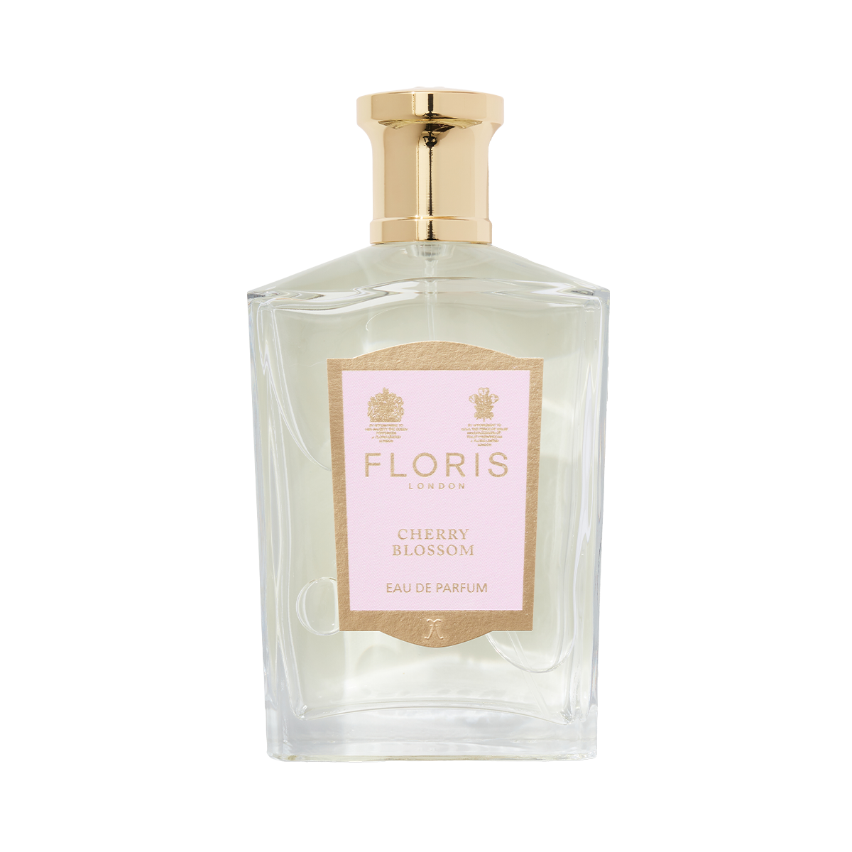 A clear glass bottle of Floris London Cherry Blossom - Eau de Parfum with a gold cap and pink label, capturing the cherry blossom fragrance.