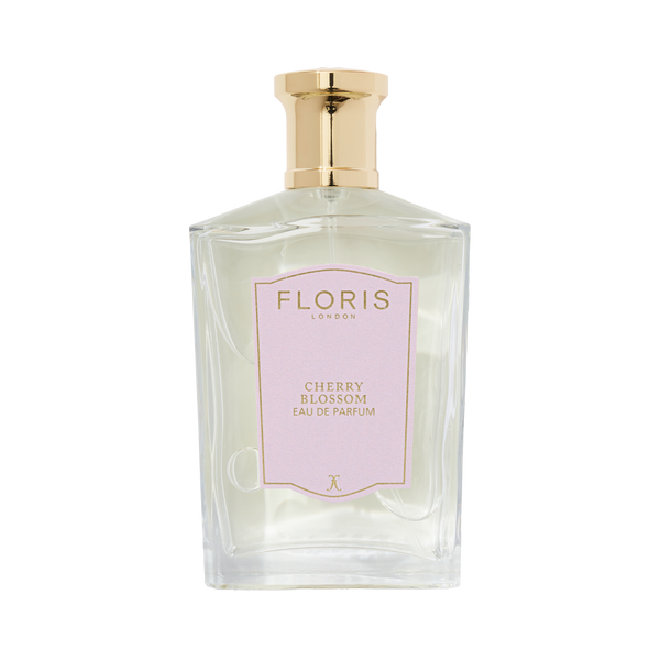 Floris London Cherry Blossom Eau de Parfum in a glass bottle with a gold cap and a pale pink label.