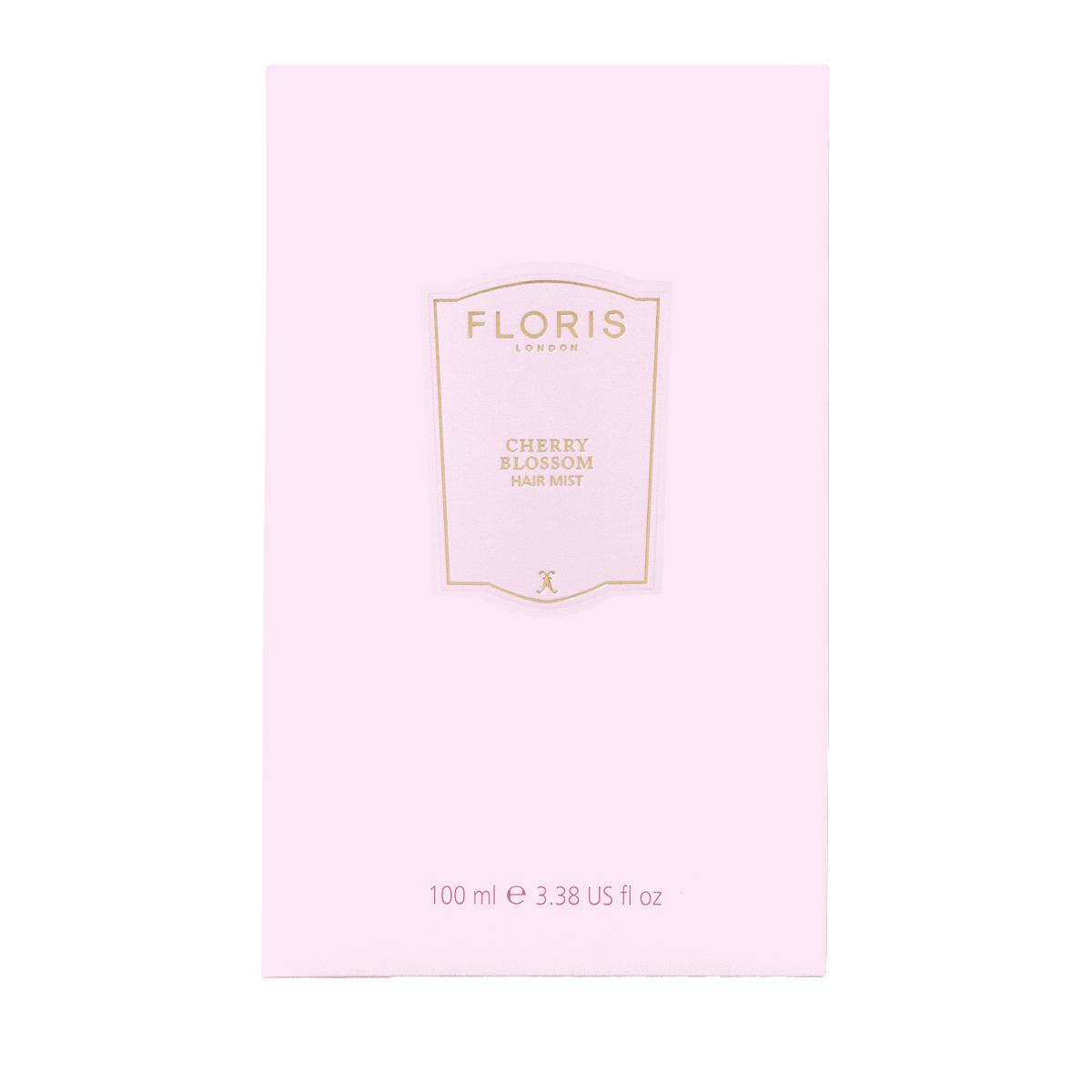 A pale pink rectangular box of Floris London Cherry Blossom - Eau de Parfum hair mist, with a central label and volume details printed at the bottom.