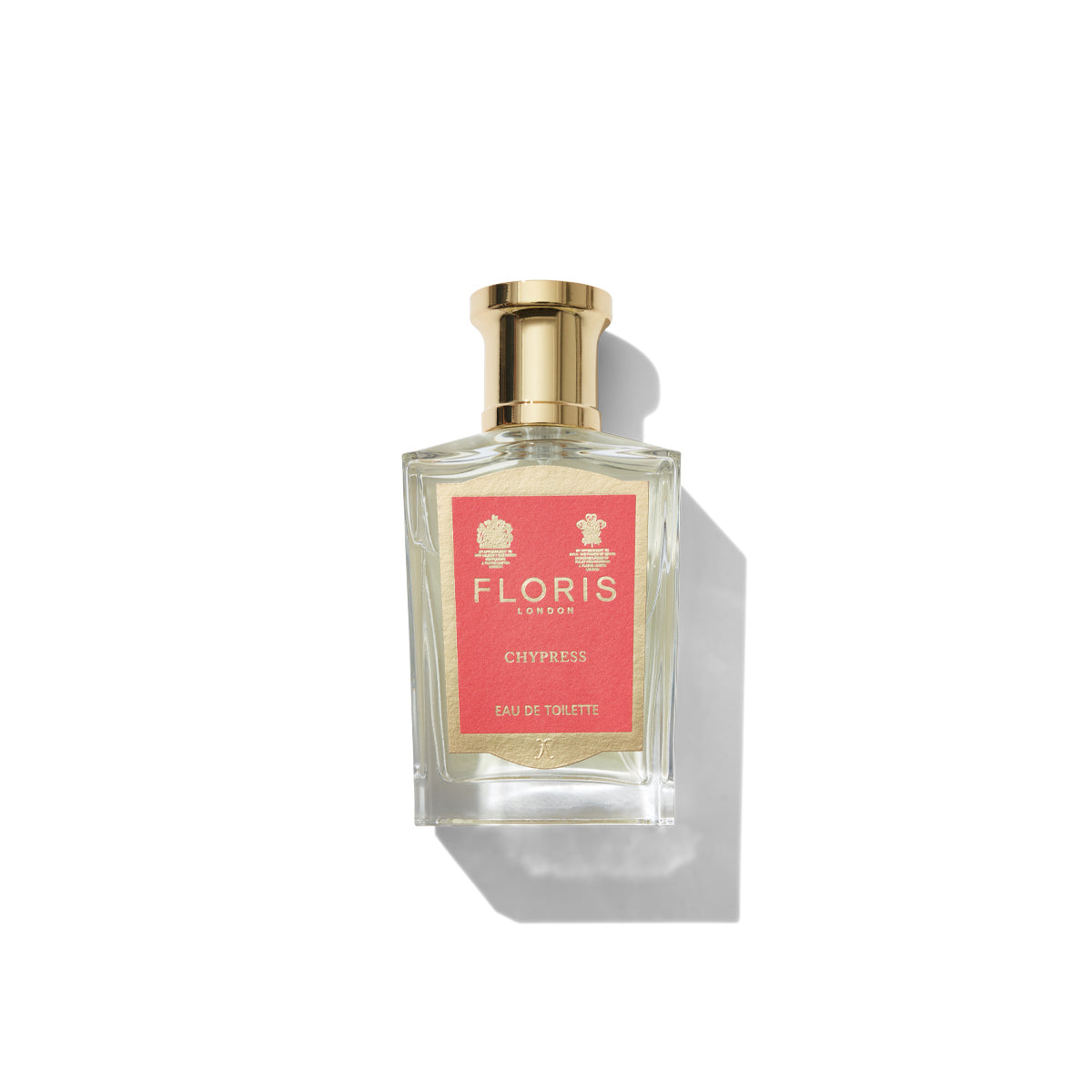 A Floris London Chypress Eau de Toilette bottle with a gold cap and a pink label on a white background, featuring notes of enveloping musk.