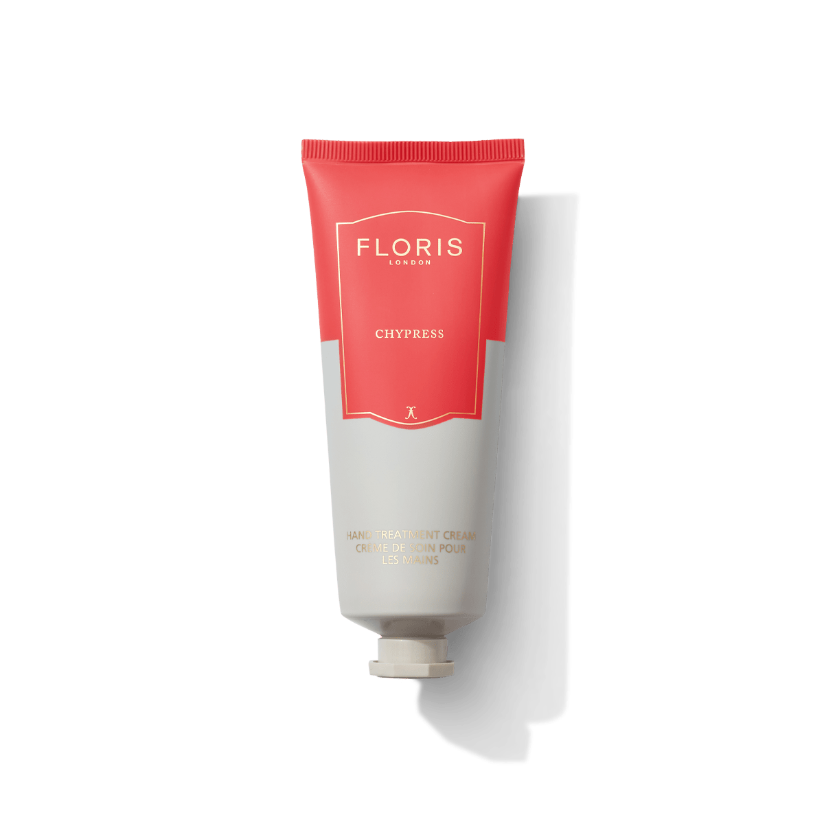 A red and white tube of Floris London's Chypress Hand Treatment Cream, 100% vegan and nourishing, perfect for pampering your hands.