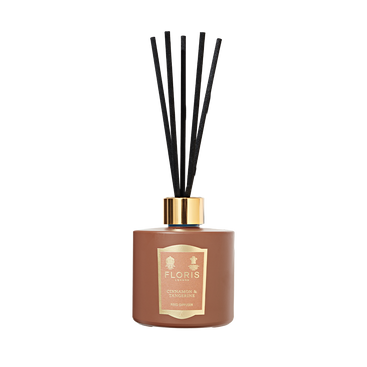Floris London Cinnamon & Tangerine Reed Diffuser 200ml with black reeds and gold label, featuring a warm spice blend fragrance.