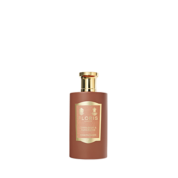 A brown Floris London bottle with gold cap and label, filled with Cinnamon & Tangerine Room Fragrance featuring warm cinnamon and orange notes.