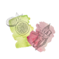 Illustration with citrus fruits on green watercolor and a lily flower on pink watercolor background.