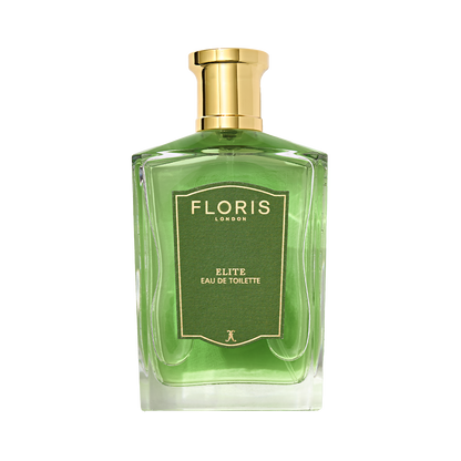 A green bottle of Floris London Elite - Eau de Toilette with a gold cap, featuring woody and citrus notes, shown on a white background.