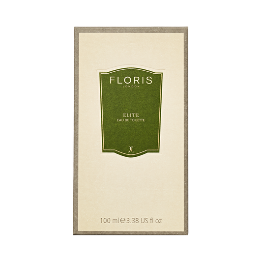A 100ml bottle of Floris London Elite - Eau de Toilette, a woody fragrance with citrus notes and a green label, set on a beige background.