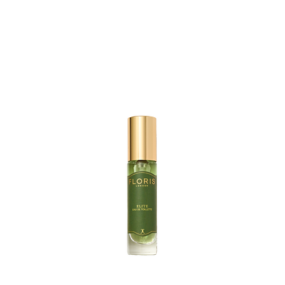 A green Floris London Elite - Eau de Toilette bottle with a gold cap is centered on white, reflecting its woody patchouli and vetiver scent.