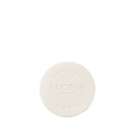 Floris London Elite - Shaving Bowl Refill 100g is a round white soap embossed with the brand, enriched with shea butter for a smooth, woody-scented lather.