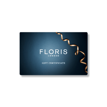 A Gift Card from Floris London on a dark background, adorned with a gold ribbon.