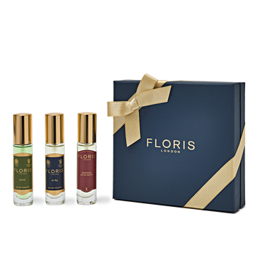 Explore the Perfumer's Trilogy: For Him gift set by Floris London, an ideal choice for the festive season. This set includes three exquisite bottles of British men's fragrances and is elegantly packaged in a blue box adorned with a gold ribbon.