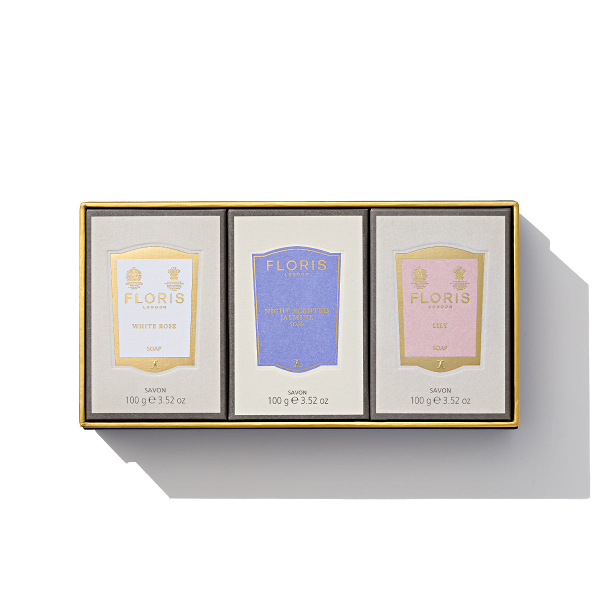 A trio from the Floris London Soap Collection | For Her, featuring floral elegance with scents of White Rose, White Heather & Lavender, and Elite, beautifully presented in a gold-bordered box.
