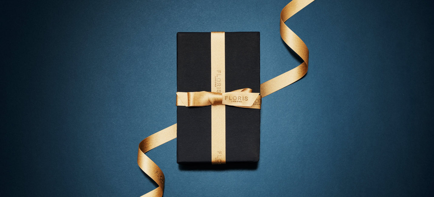 Showcasing Floris London US's gift wrapping service, with beautifully wrapped packages in luxurious paper and ribbon.