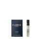A 2 ml sample vial of Floris London Golden Amber - Eau de Parfum beside its blue and gold box. A refined vegan scent experience.
