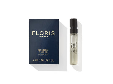 Floris London's Golden Amber Eau de Parfum, vegan-friendly, 2ml with spray bottle in a navy box.