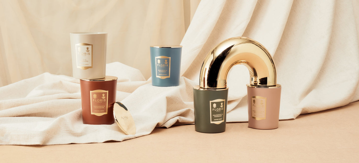 Floris London Candle Collection shown on a white sheet