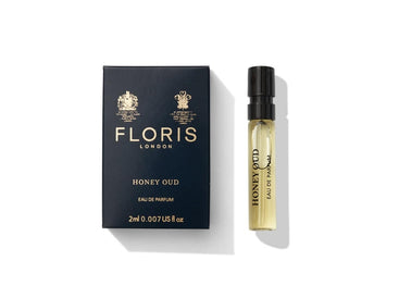 Floris London's Honey Oud Eau de Parfum, with rich Oud Oil, is packaged in a stylish box with a 2ml spray vial on a pristine white background.