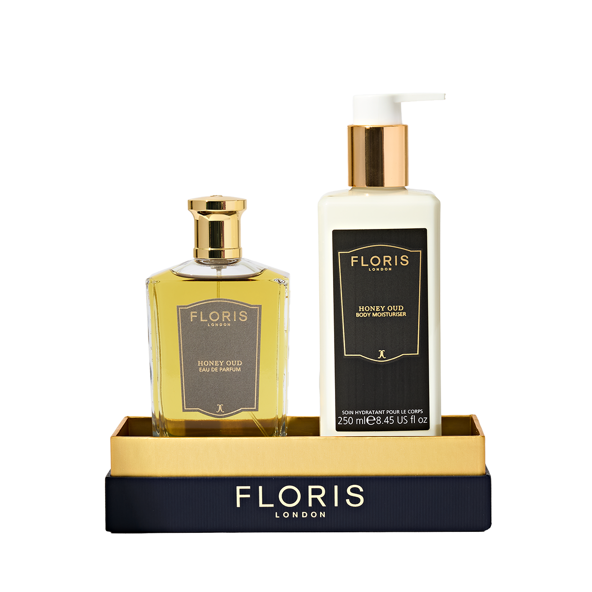 Floris London US Sweet Lux | Honey Oud Duo set with Eau de Parfum and moisturizer in a black and gold box.