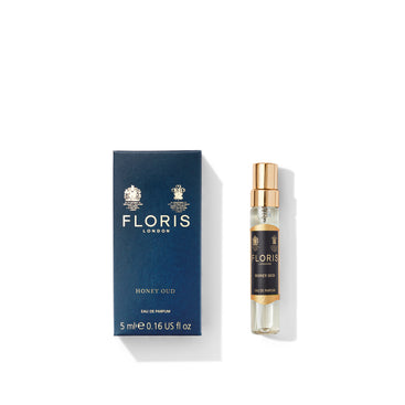 Floris London's Honey Oud Eau de Parfum 5ml showcases hints of rose with its bottle and box on a white background.