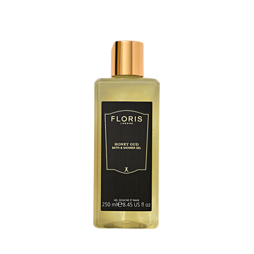 Floris London Honey Oud Bath & Shower Gel 250ml: a clear bottle with black label, gold cap, and an English honey fragrance.
