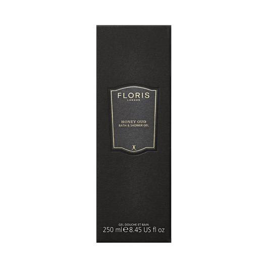 Floris London Honey Oud Bath & Shower Gel 250ml comes in a black rectangular box with gold and white text, featuring an English honey scent.