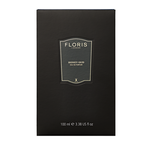 Floris London Honey Oud - Eau de Parfum 100ml comes in a black box with gold and white text, featuring notes of English honey and rich oud oil.