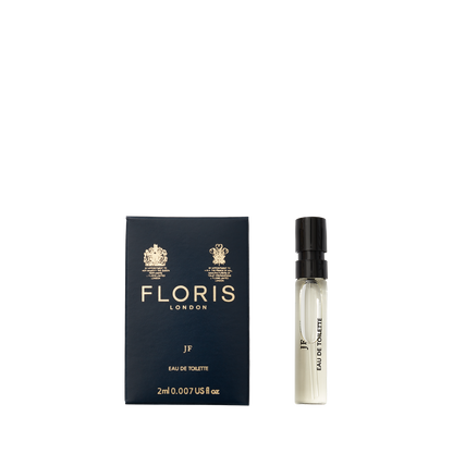 A Floris London JF - Eau de Toilette citrus woody fragrance sample in a dark blue box with a small vegan spray vial.