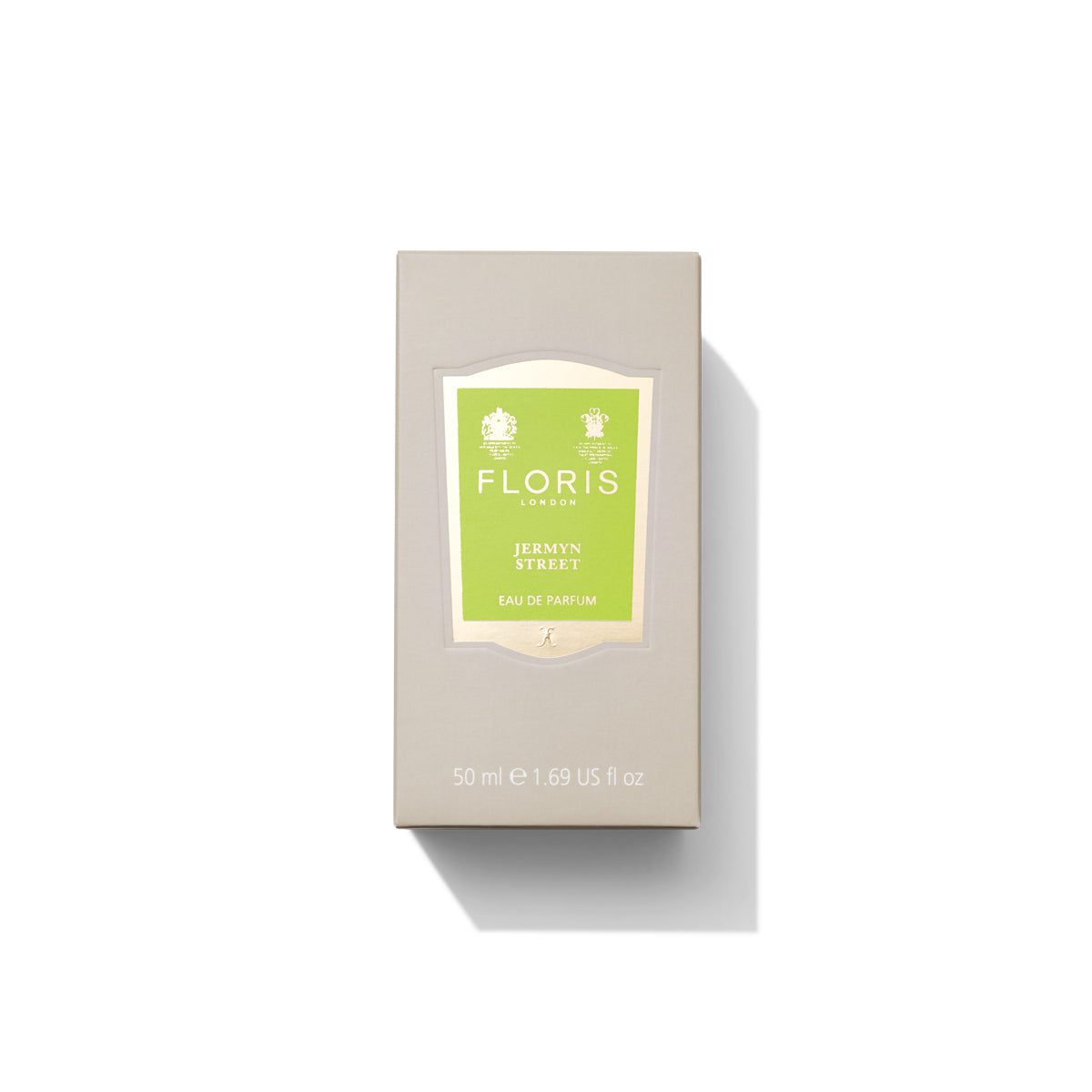 A beige box of Floris London Jermyn Street - Eau de Parfum with a green label, 50 ml size, on a white background. This vegan Eau de Parfum combines classic elegance with modern charm.