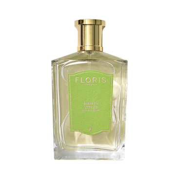 A clear glass bottle of Floris London Jermyn Street - Eau de Parfum with a gold cap and green label.