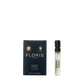 A Floris London Jermyn Street - Eau de Parfum vegan sample vial shown next to its dark blue box with gold text and logos.