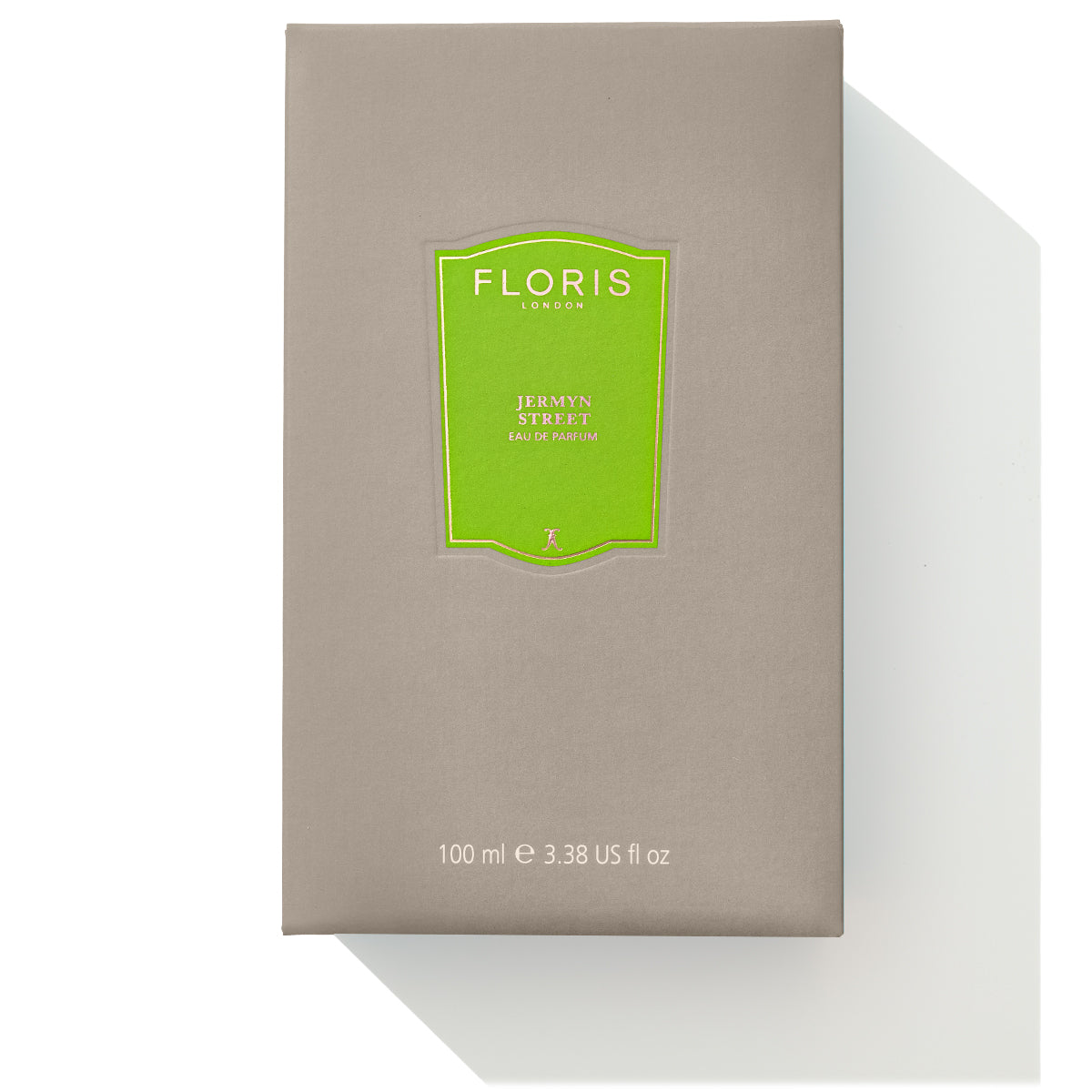 A rectangular gray box from Floris London encases their Jermyn Street - Eau de Parfum (100 ml), featuring a green label on the front that hints at its sophisticated blend of vetiver and gin.