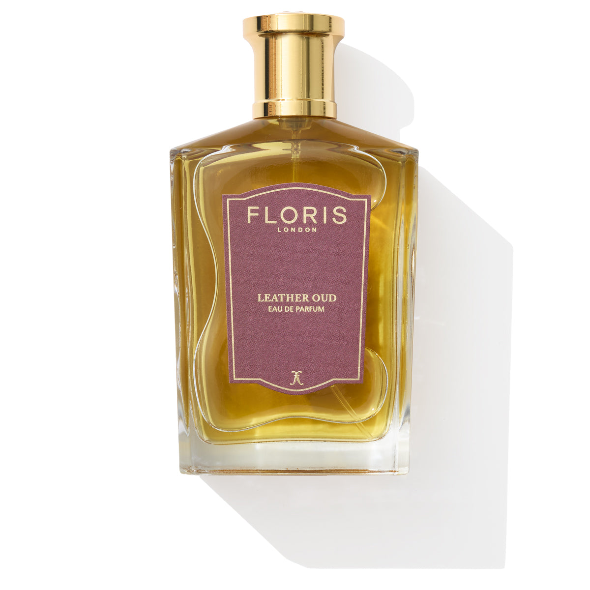 Floris London Leather Oud Eau de Parfum features a gold cap and burgundy label, enriched with the luxurious essence of leather oud.