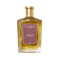 A bottle of Floris London's Leather Oud Eau de Parfum, featuring a gold cap and brown label, enhanced with oud oil.